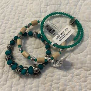 Alex and Ani bundle.   2 wrap and one slide bracelets